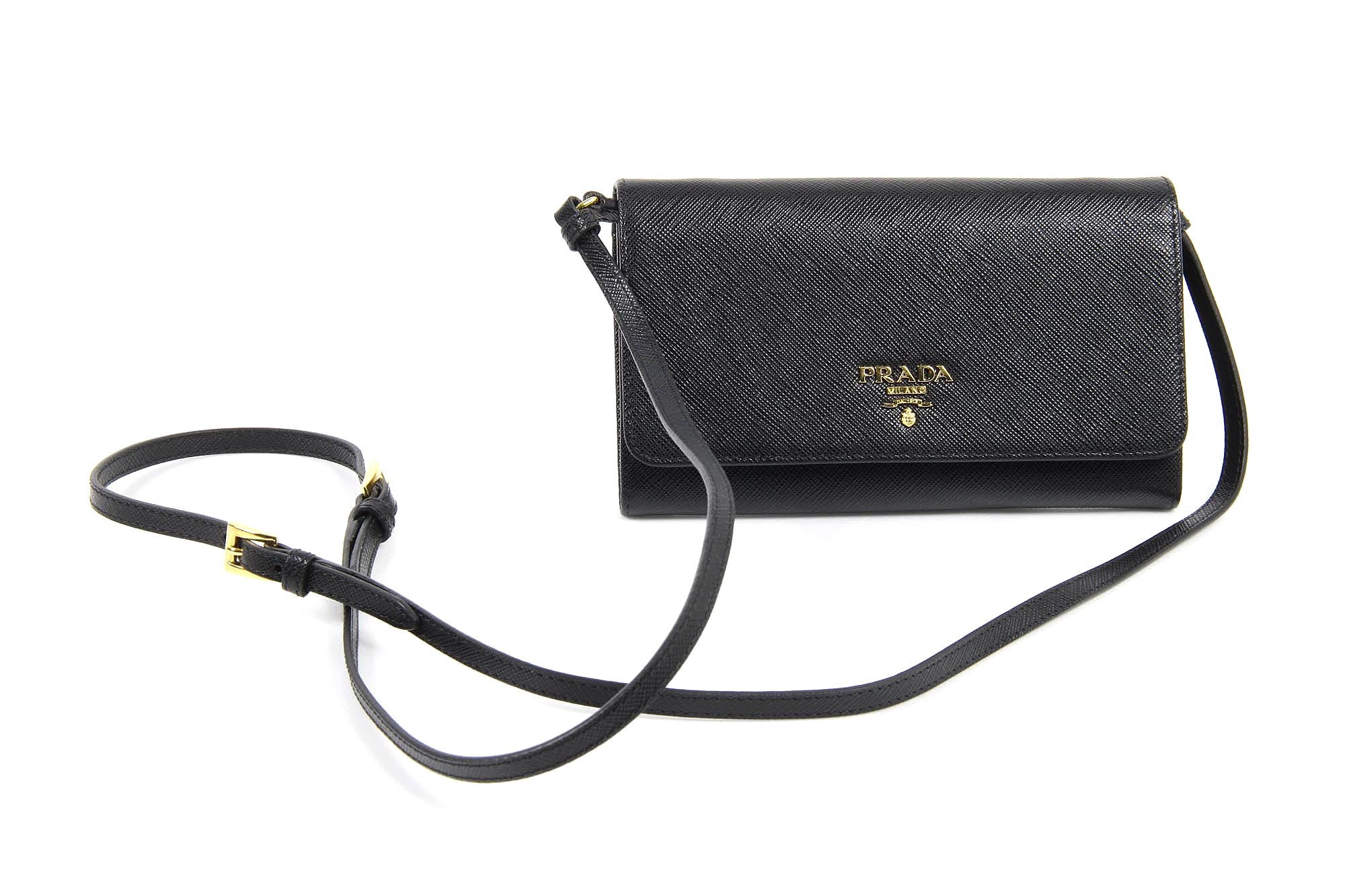 Prada Clutch 389940 | Extension-fmedShops | Its never about the Pre-Owned  bags with this family and its daughters